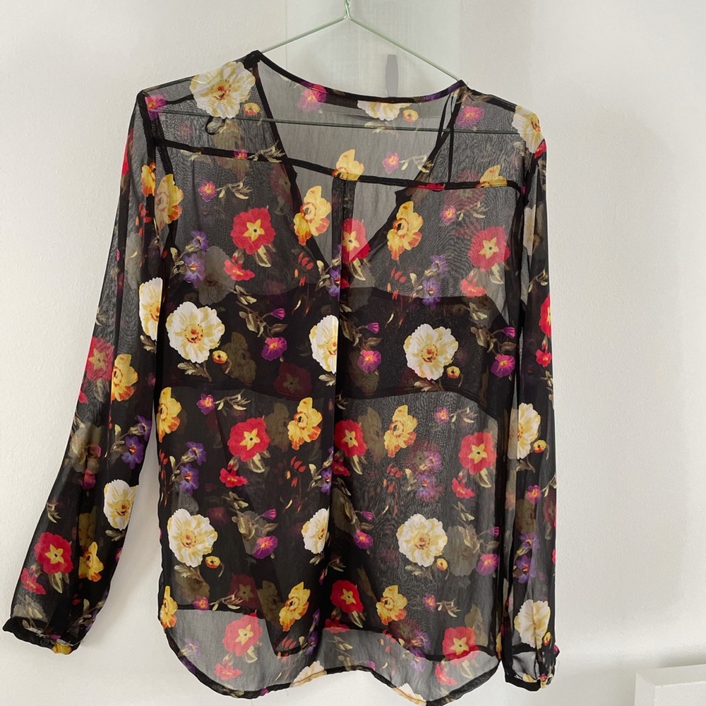 Very cute, sheer floral blouse- loose-fitting, can be dressed up or down